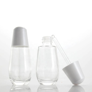 Wholesale 30ml Small Bulb Serum Dropper Glass Bottle Essence Bottle with Press Pump Button