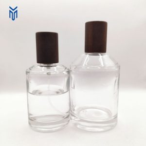 Hot sale Wooden Perfume Bottle 50ml 100ml Cylinder clear Spray Glass Perfume Bottle