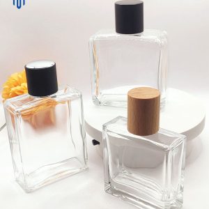 Factory wholesale 50ml 100ml Transparent Rectangular Glass Perfume Spray Bottle with Wooden Cap